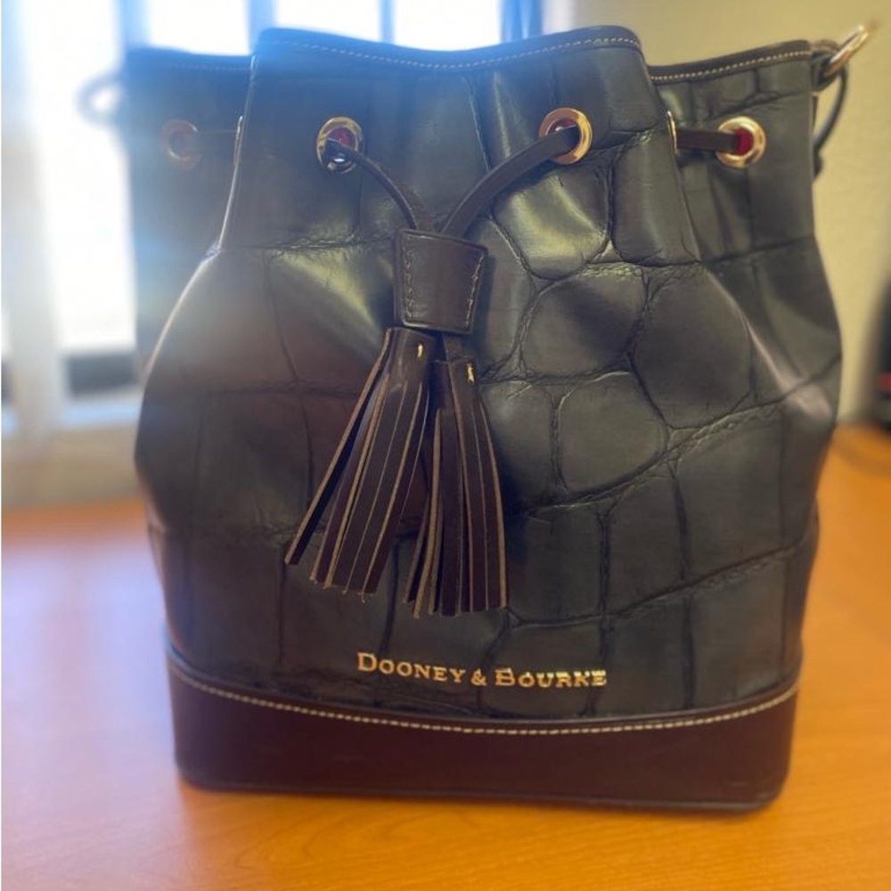 Dooney&Bourke genuine Italian leather drawstring bucket bag.  Pre owned.